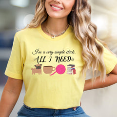 "I'm a very simple chick. ALL I NEED is" Cozy Lifestyle Graphic Tee, a Comfort-First Pick for Introverts