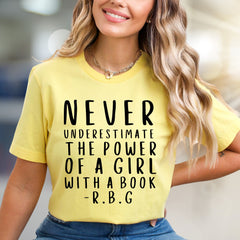 "NEVER UNDERESTIMATE THE POWER OF A GIRL WITH A BOOK -R.B.G" Empowerment Graphic Tee, a Feminist Pick for Readers