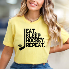 "EAT. SLEEP. HOCKEY. REPEAT." Hockey Lover Graphic Tee, a Lifestyle Pick for Sports Fans