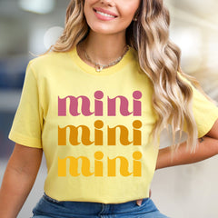 "mini mini mini" Retro Groovy Graphic Tee, a Playful Pick for Trendsetters