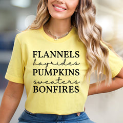 "Flannels Hayrides Pumpkins Bonfires" Fall Vibe Graphic Tee, a Cozy Autumn Pick for Seasonal Enthusiasts