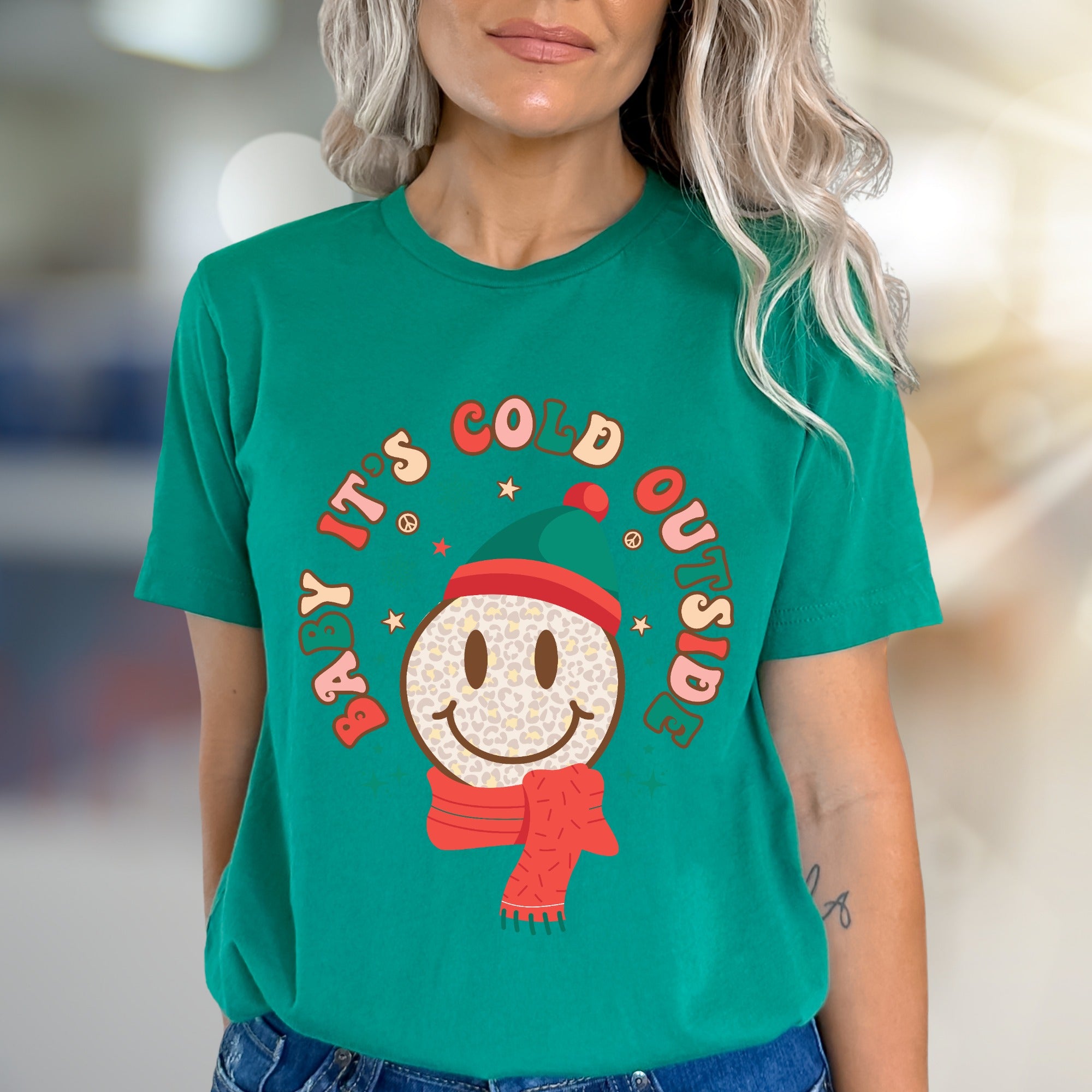 "Baby It's Cold Outside" Winter Smiley Graphic Tee, a Festive Comfort Pick for Holiday Lovers
