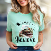 "BELIEVE" Christmas Train Graphic Tee, a Winter Wonderland Pick for Holiday Enthusiasts