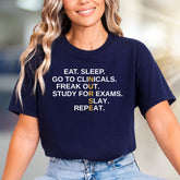 "EAT. SLEEP. GO TO CLINICALS. FREAK OUT. STUDY FOR EXAMS. SLAY. REPEAT." Nurse Life Unisex Tee, a Student Motivation Pick for Healthcare Heroes
