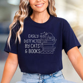 "Easily Distracted By Cats & Books" Cozy Reader Graphic Tee, a Feline-Friendly Pick for Book Lovers