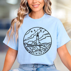 "MAINE DIRIGO" Lighthouse Graphic Tee, a Coastal State Pick for Travelers