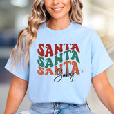 "SANTA SANTA SANTA Baby" Retro Christmas Graphic Tee, a Festive Niche for Holiday Enthusiasts