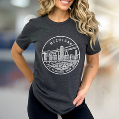 "MICHIGAN E PLURIBUS UNUM" Cityscape Graphic Tee, a State Pride Pick for Travel Enthusiasts