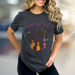 "COME WE FLY!" Witchy Broomstick Graphic Tee, a Spooky Chic Pick for Halloween Enthusiasts