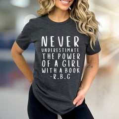"NEVER UNDERESTIMATE THE POWER OF A GIRL WITH A BOOK -R.B.G" Empowerment Graphic Tee, a Feminist Pick for Readers