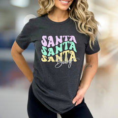 "SANTA SANTA SANTA Baby" Retro Christmas Graphic Tee, a Festive Niche for Holiday Enthusiasts