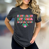 "SANTA CLAUS, REINDEER, HOT COCOA" Retro Christmas Graphic Tee, a Festive Pick for Holiday Lovers