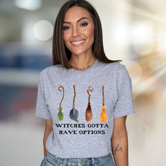 "Witches Gotta Have Options" Halloween Broomstick Graphic Unisex Tee, a Witchy Pick for Spooky Season Enthusiasts