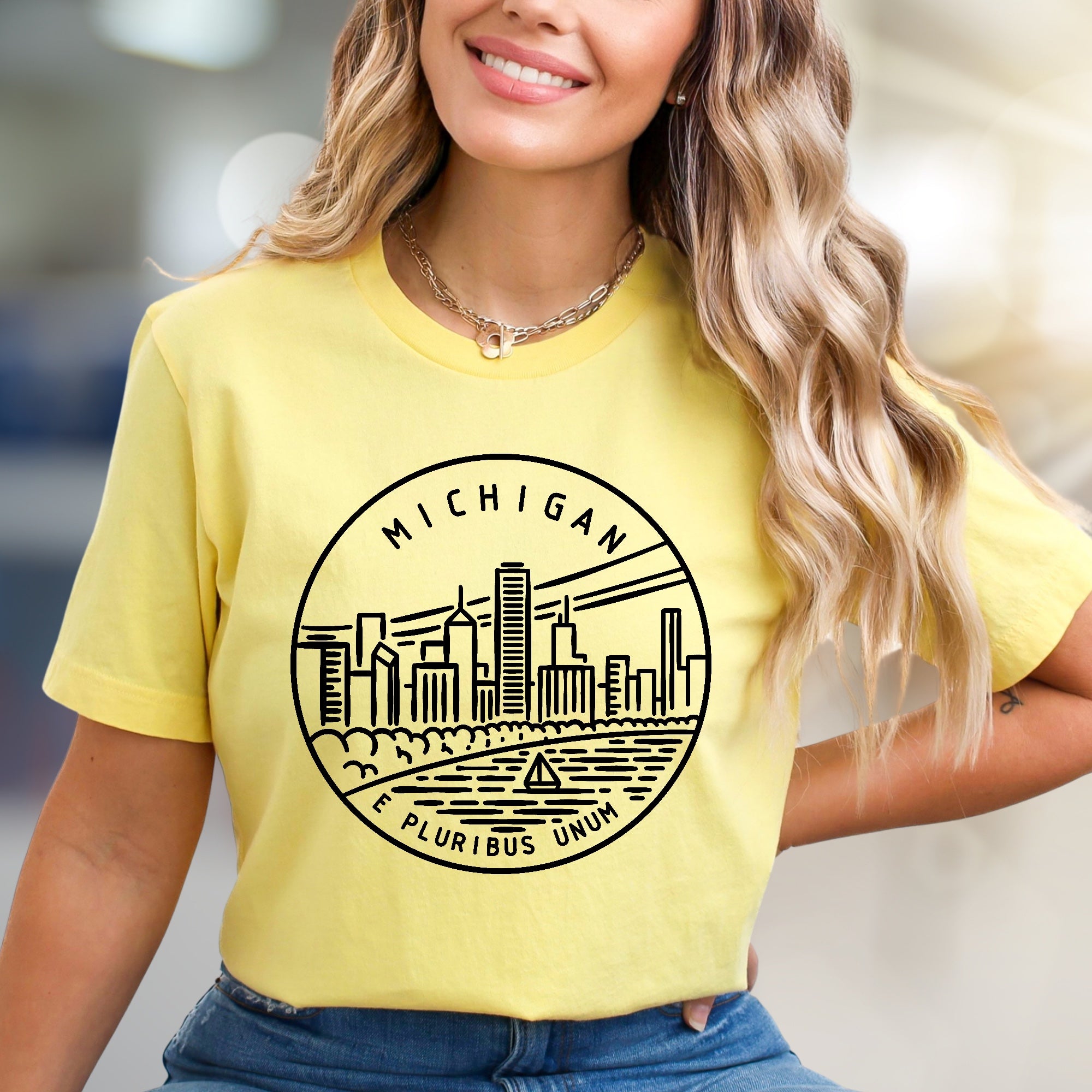 "MICHIGAN E PLURIBUS UNUM" Cityscape Graphic Tee, a State Pride Pick for Travel Enthusiasts