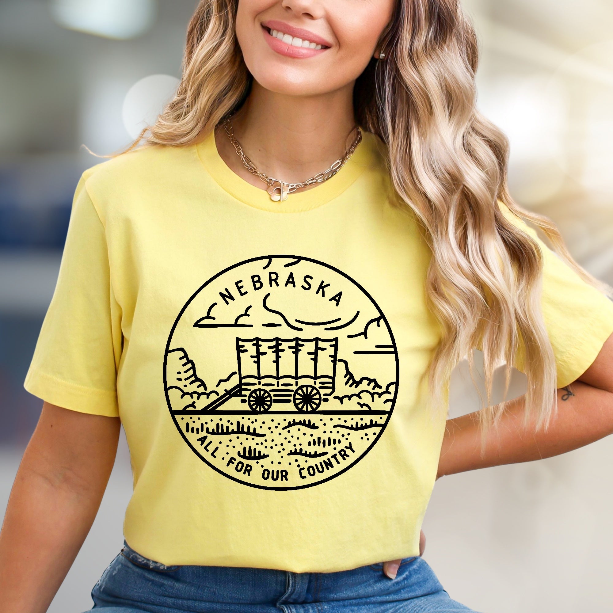 "NEBRASKA ALL FOR OUR COUNTRY" Pioneer Wagon Graphic Tee, a Heritage Pick for State Enthusiasts