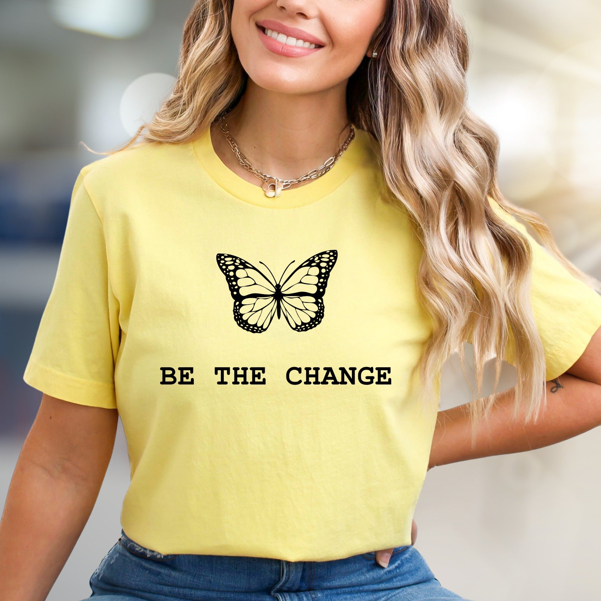 "BE THE CHANGE" Butterfly Graphic Tee, an Empowering Pick for Activists