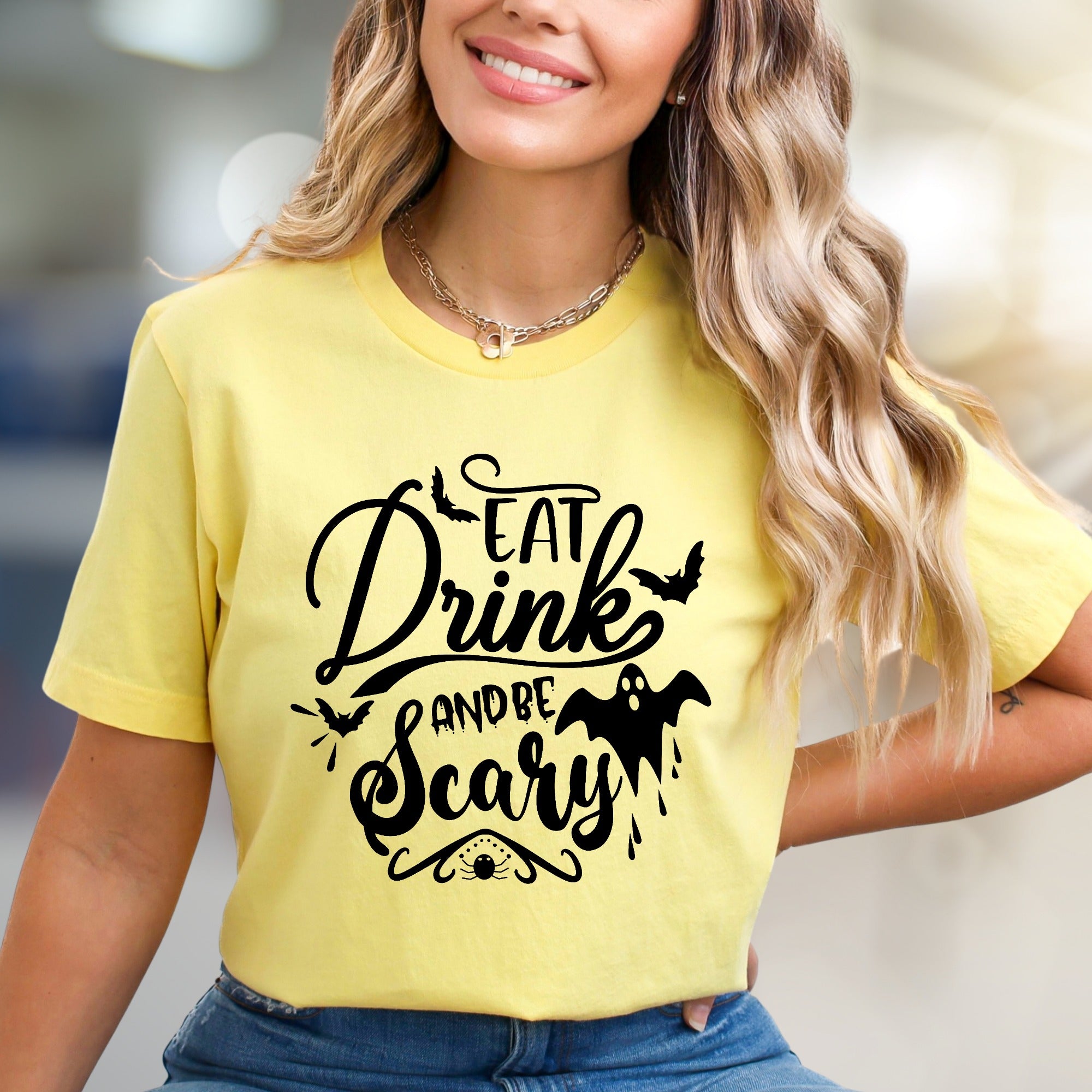 "Eat Drink And Be Scary" Halloween Graphic Tee, a Spooky Chic Pick for Partygoers