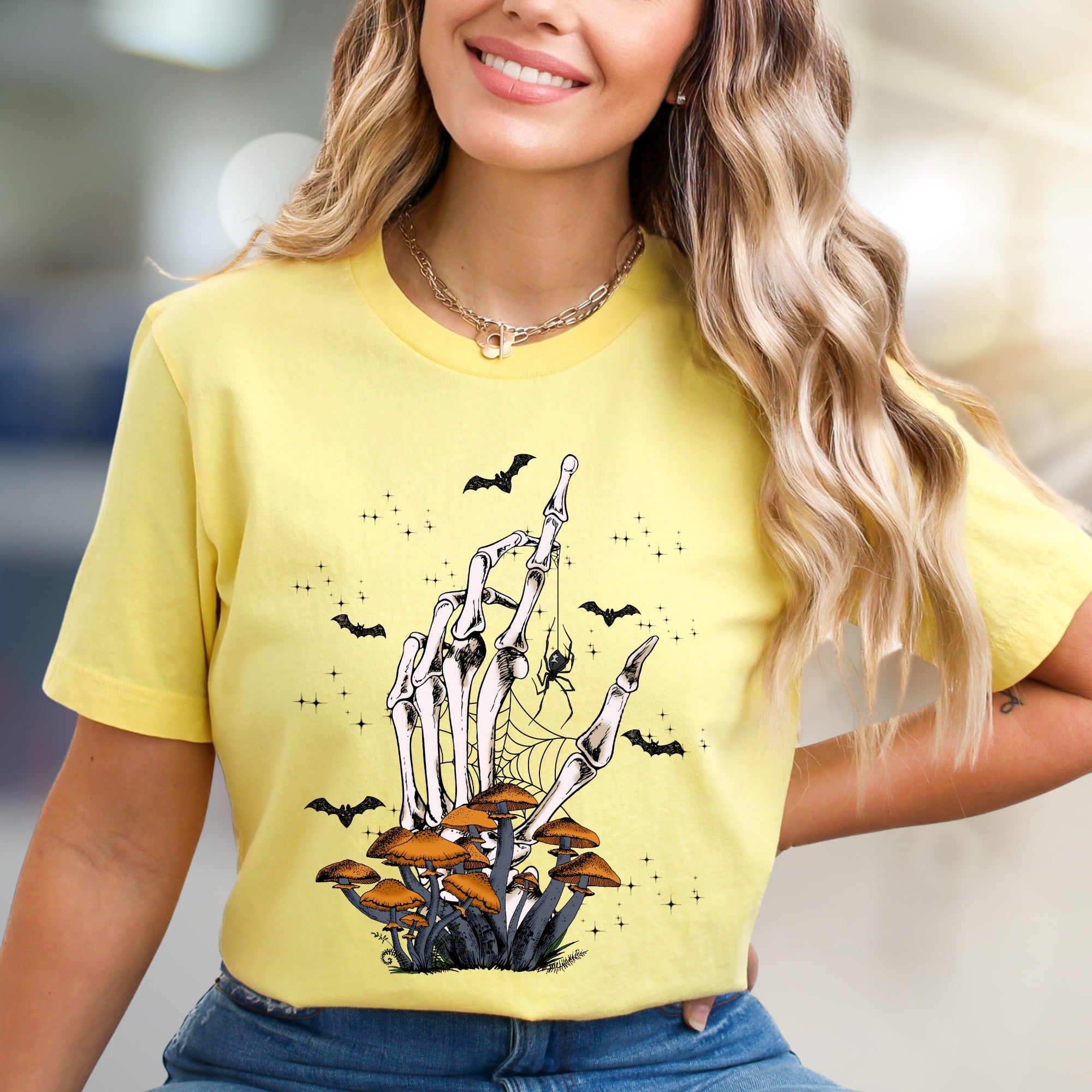 Skeleton Hand Mushroom Graphic Tee, a Spooky-Cute Pick for Halloween Lovers