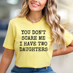 "YOU DON'T SCARE ME I HAVE TWO DAUGHTERS" Funny Parent Graphic Tee, a Bold Statement for Moms & Dads