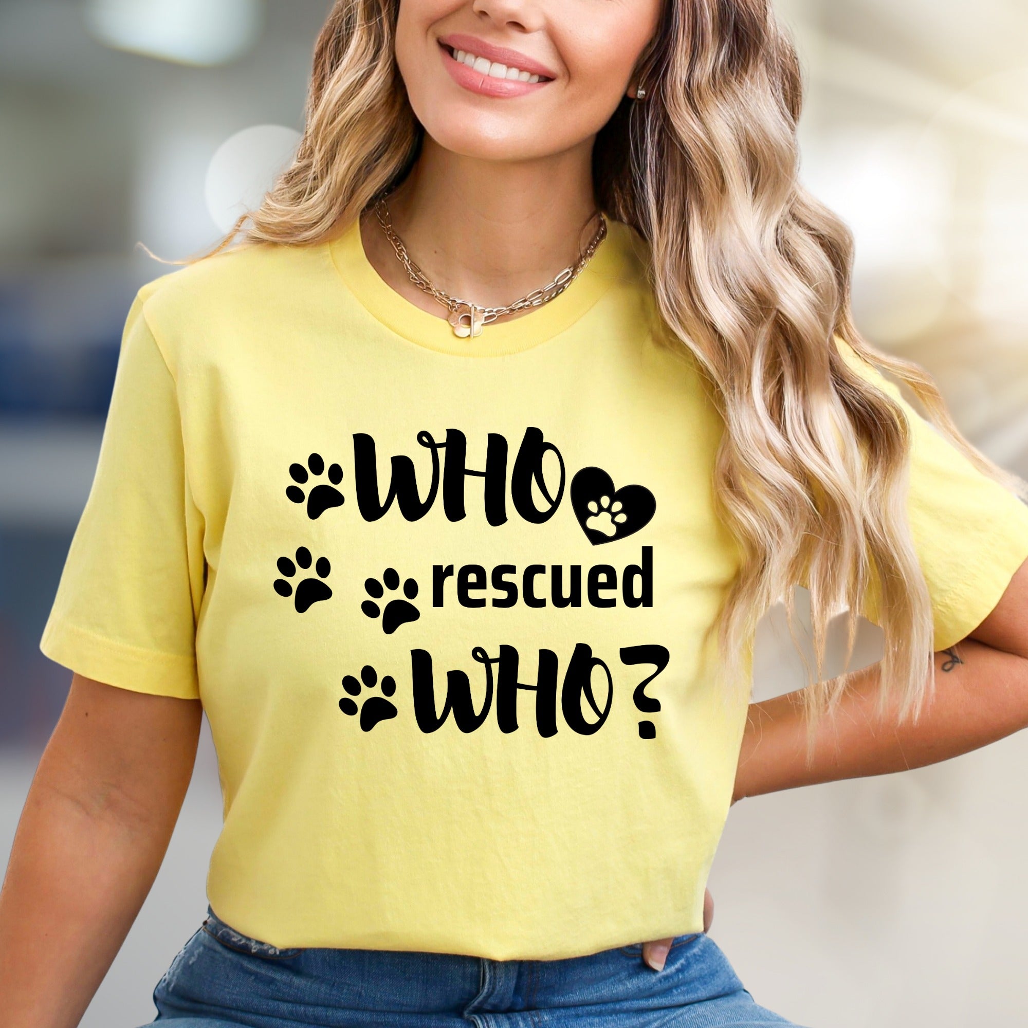 "WHO rescued WHO?" Paw Print Graphic Tee, a Heartfelt Pick for Pet Lovers