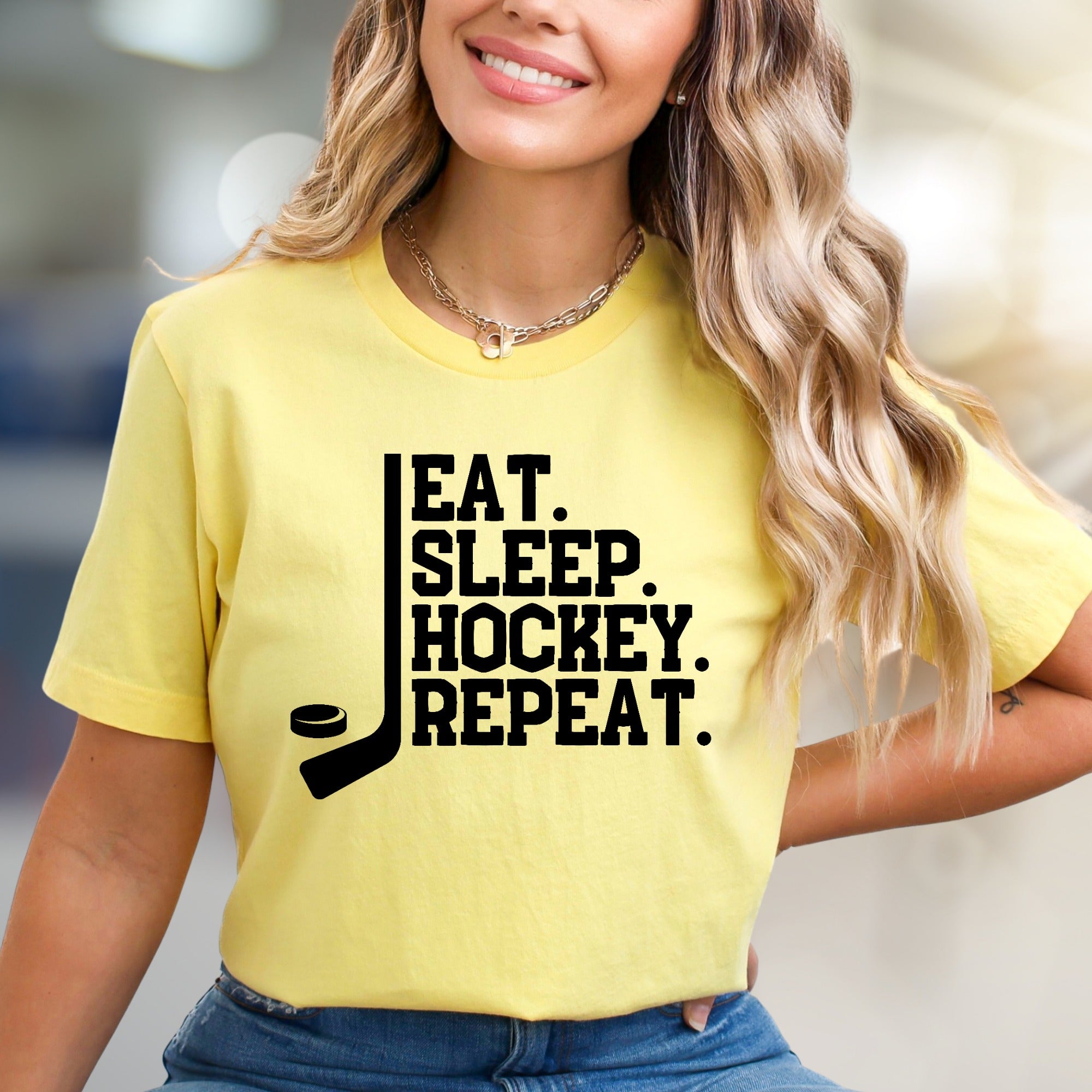 "EAT. SLEEP. HOCKEY. REPEAT." Hockey Lover Graphic Tee, a Lifestyle Pick for Sports Fans