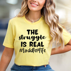 "THE STRUGGLE IS REAL #toddler life" Mom Life Graphic Tee, a Humorous Pick for Parents
