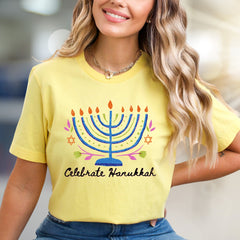 "Celebrate Hanukkah" Vibrant Menorah Graphic Tee, a Festive Holiday Pick for Enthusiasts