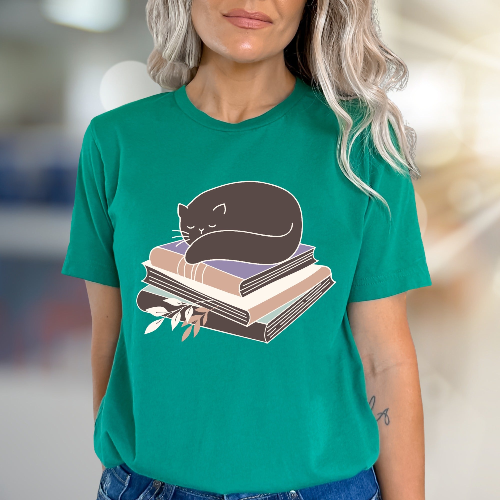 Sleeping Cat on Books Graphic Tee, a Cozy Literary Pick for Book Lovers