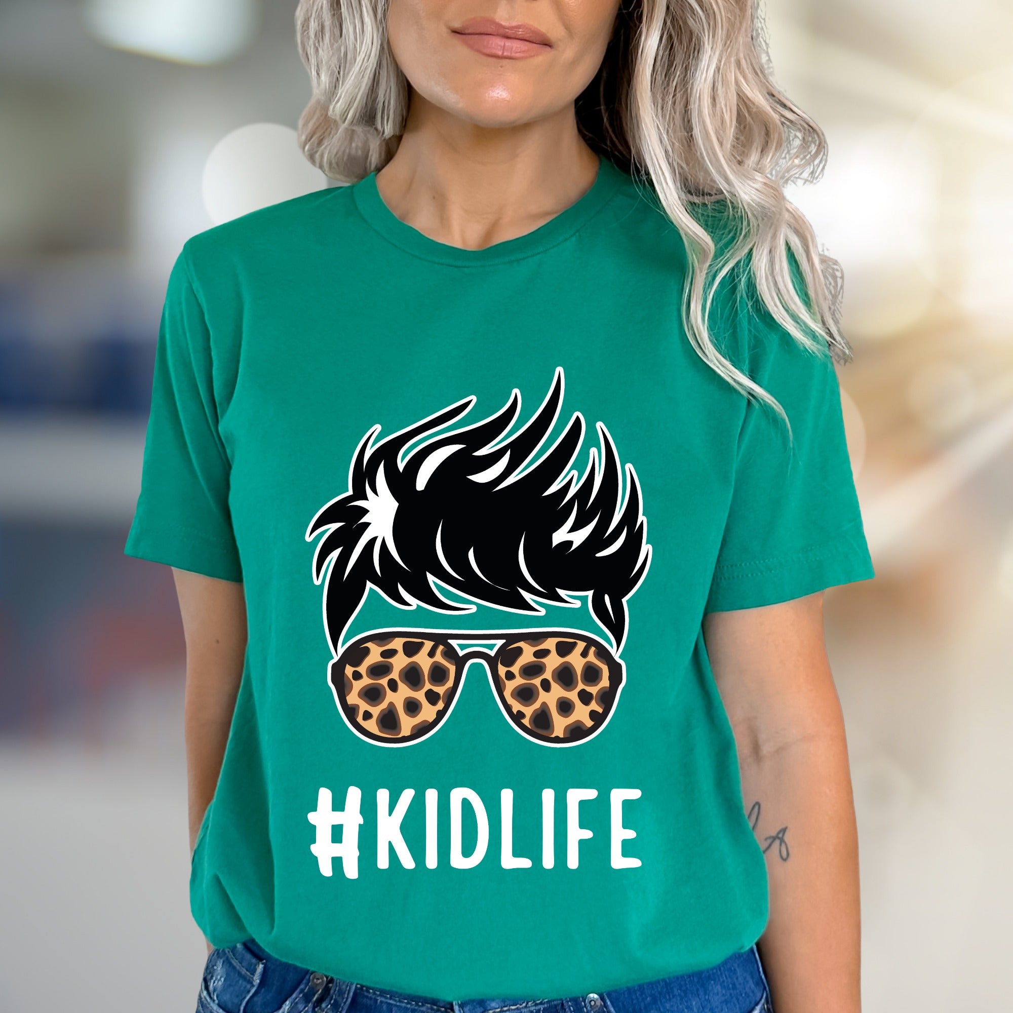 #KIDLIFE Messy Hair Bun Leopard Sunglasses Graphic Tee, a Mom Life Pick for Parents