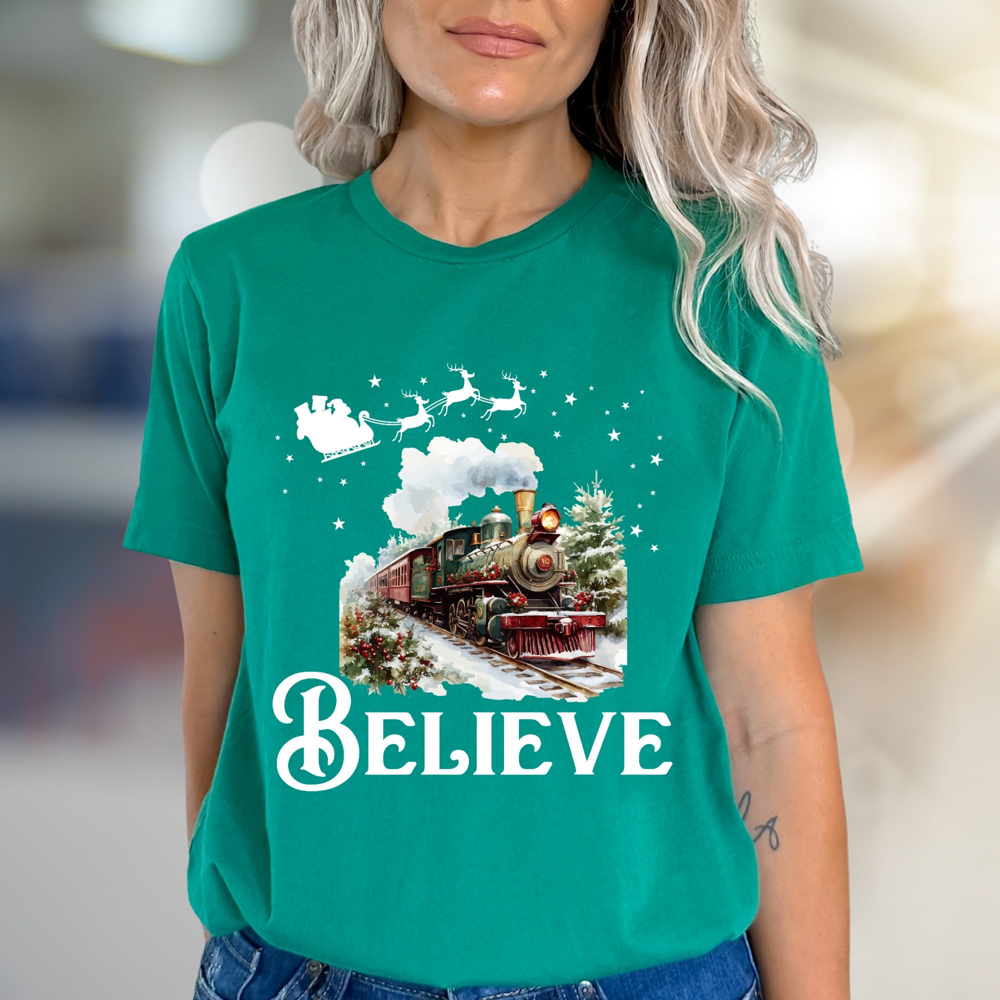 "BELIEVE" Christmas Train Graphic Tee, a Winter Wonderland Pick for Holiday Enthusiasts