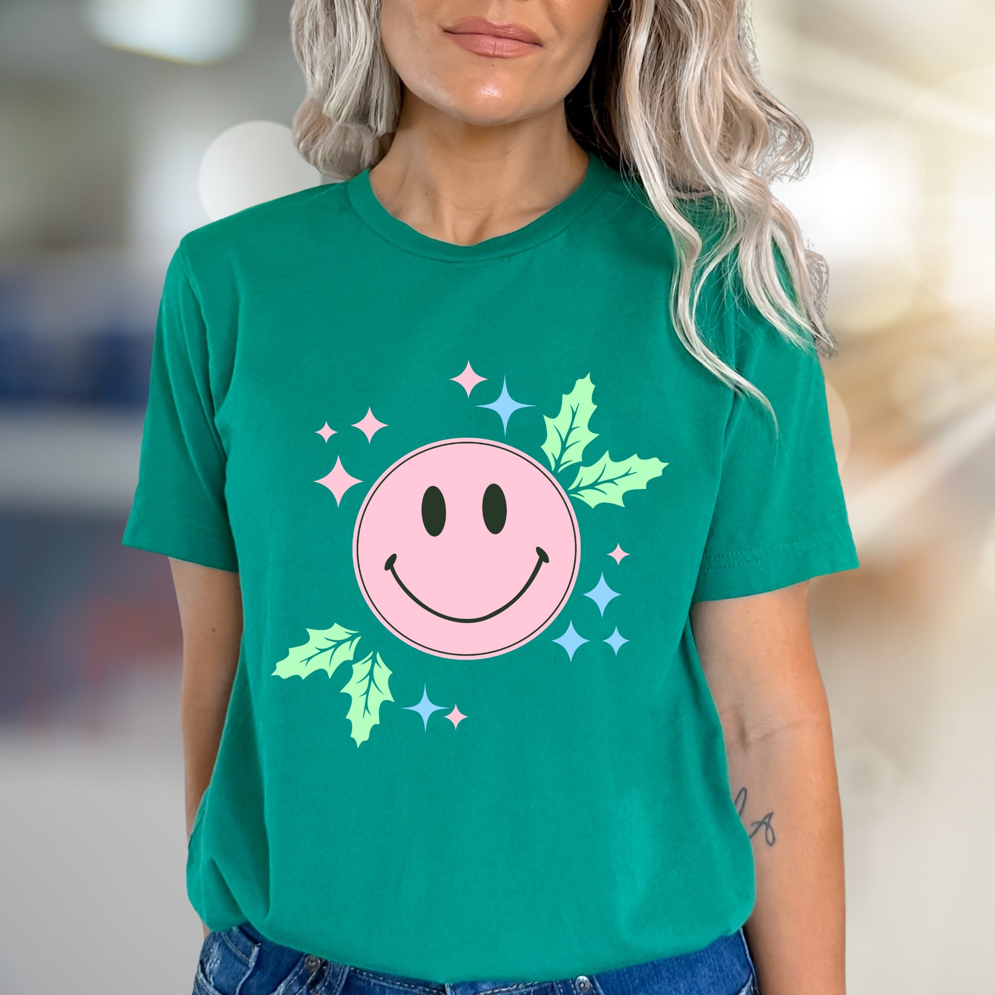 Happy Holly Jolly Smile Face Graphic Tee, a Festive Comfort Pick for Joyful Spirits
