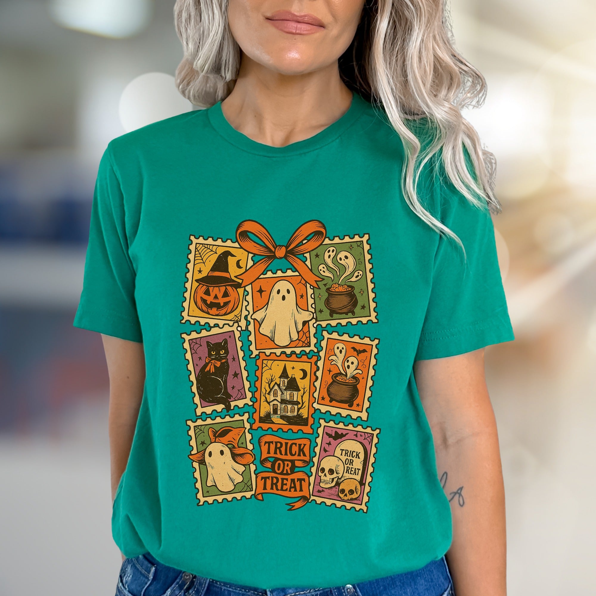 "TRICK OR TREAT" Vintage Halloween Stamp Graphic Tee, a Spooky Pick for Festive Souls