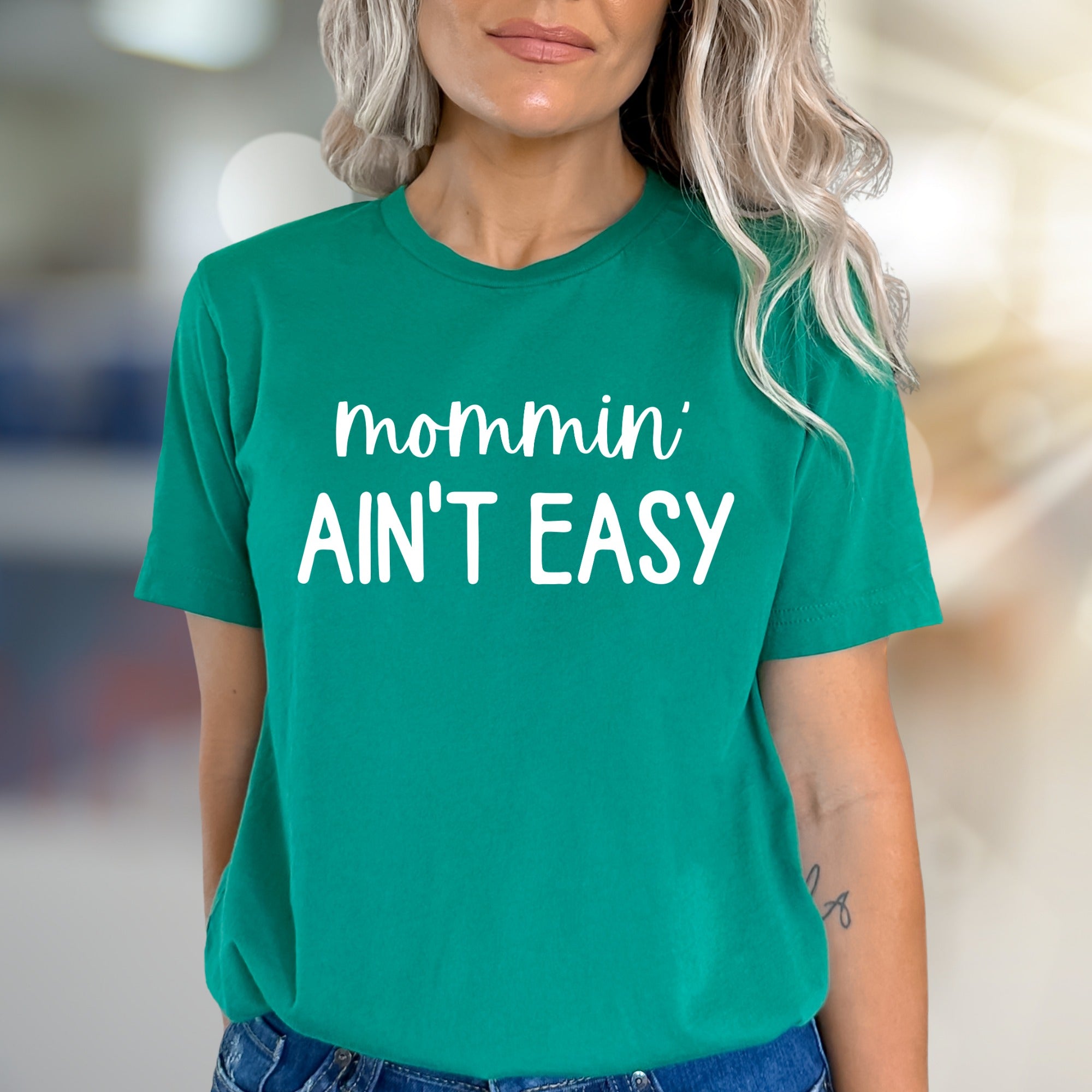 "Mommin' Ain't Easy" Humorous Graphic Tee, a Relatable Pick for Moms