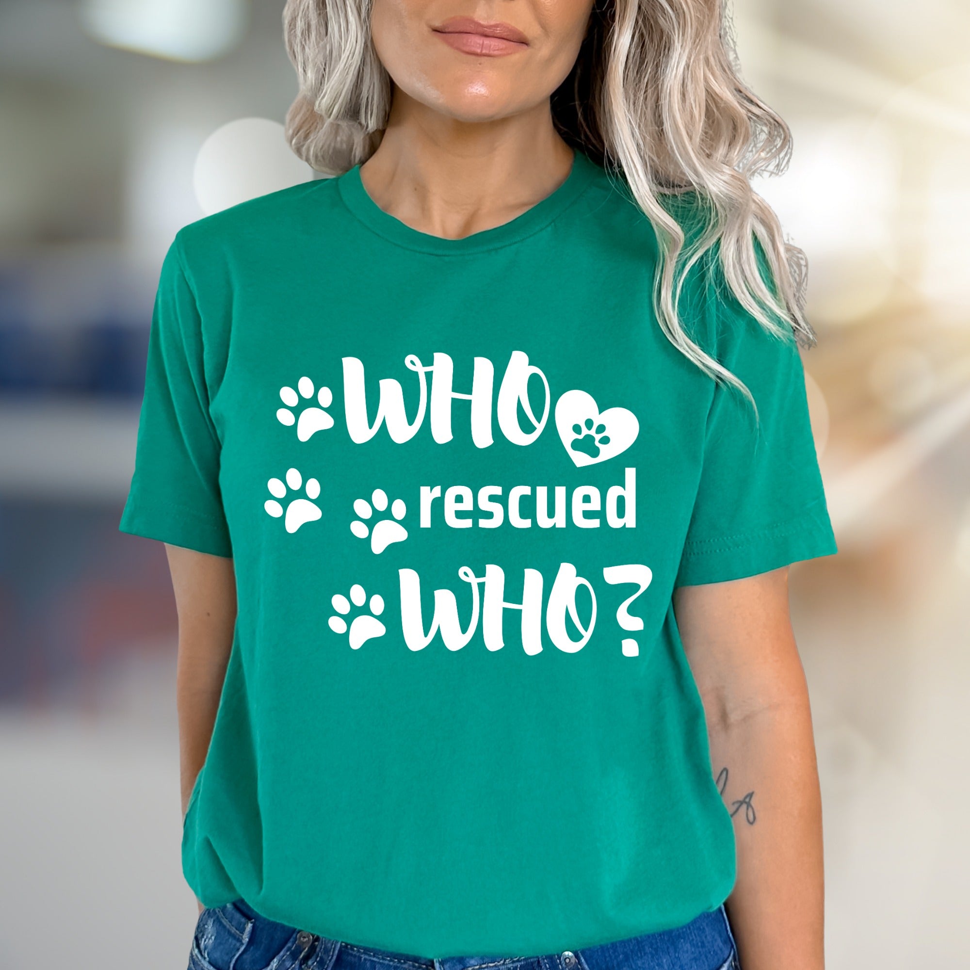 "WHO rescued WHO?" Paw Print Graphic Tee, a Heartfelt Pick for Pet Lovers