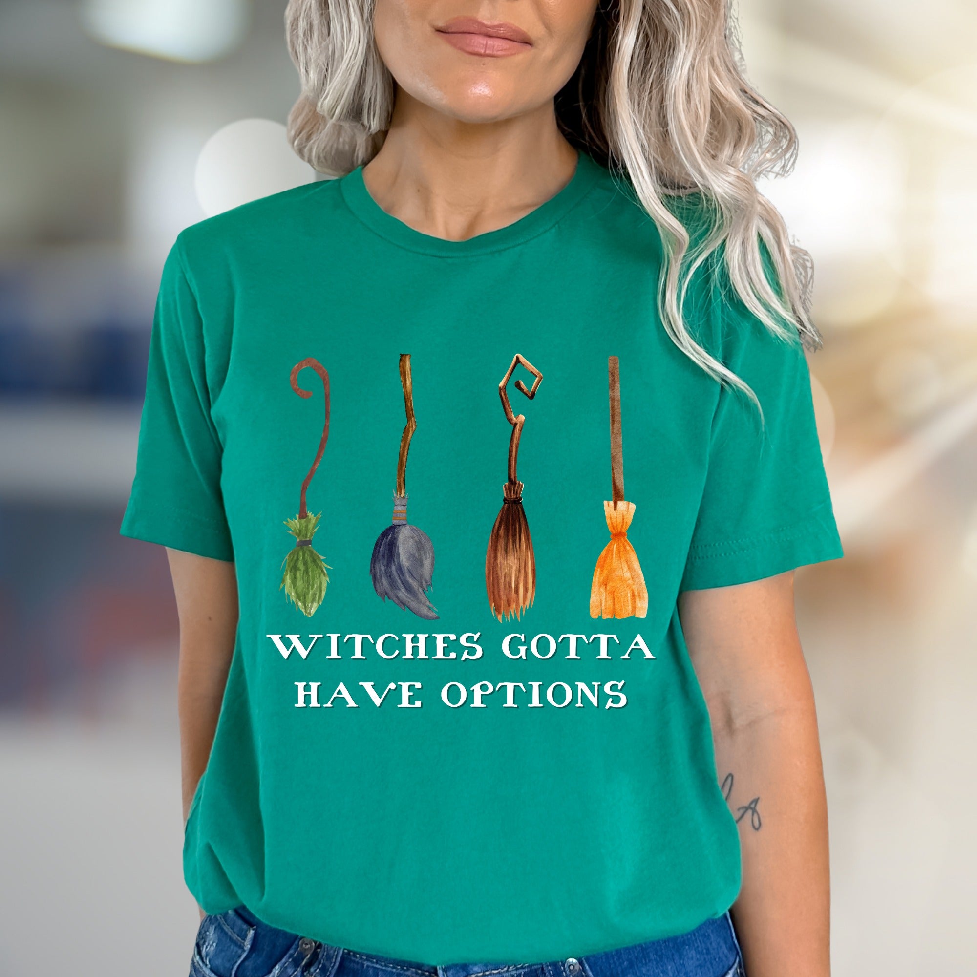 "Witches Gotta Have Options" Halloween Broomstick Graphic Unisex Tee, a Witchy Pick for Spooky Season Enthusiasts
