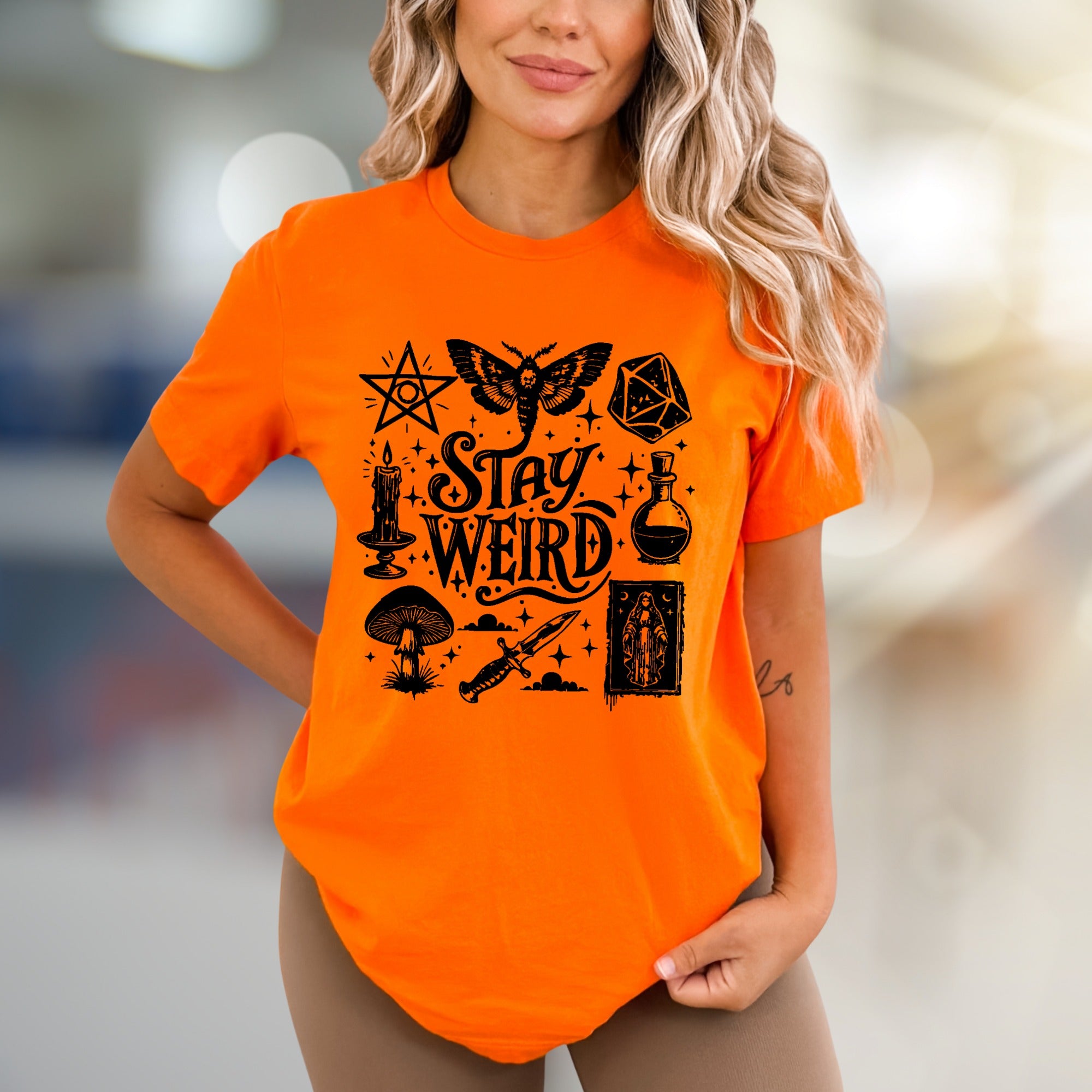"Stay Weird" Occult Graphic Tee, a Mystical Pick for Unique Souls