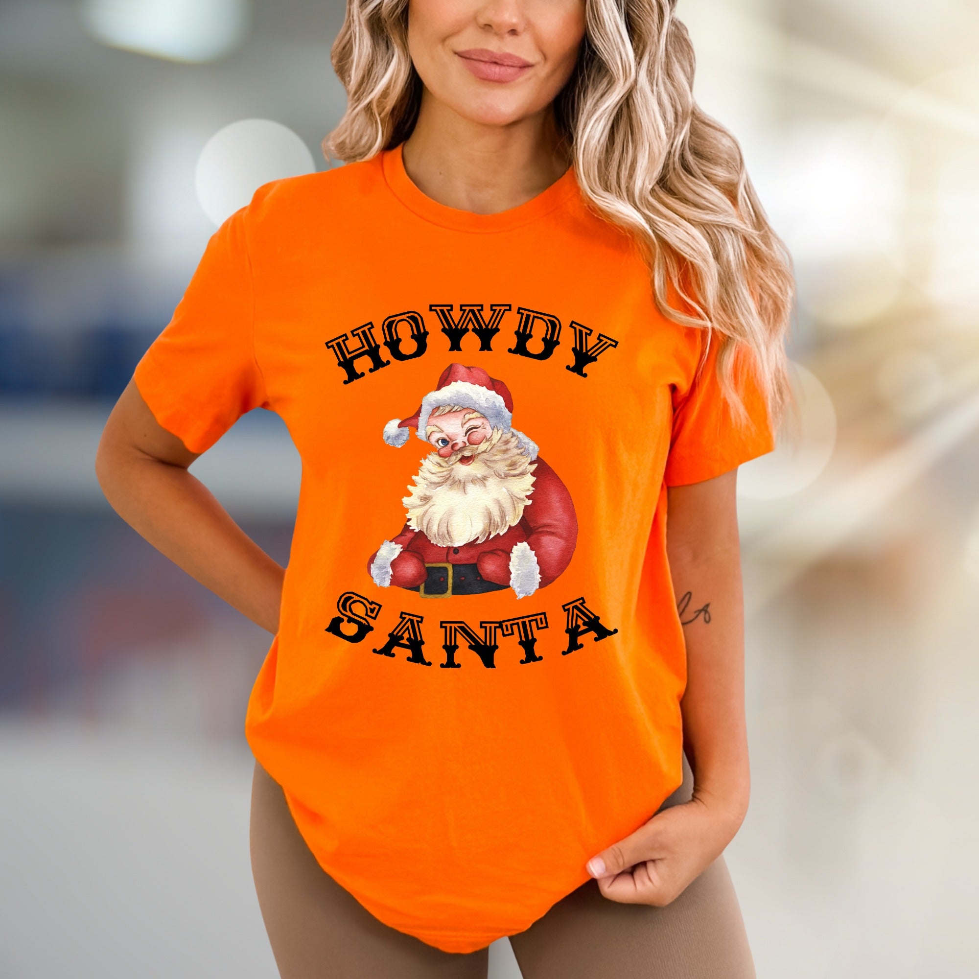 “Howdy Santa” Winking Santa Graphic Tee, a Festive Country Pick for Christmas Lovers