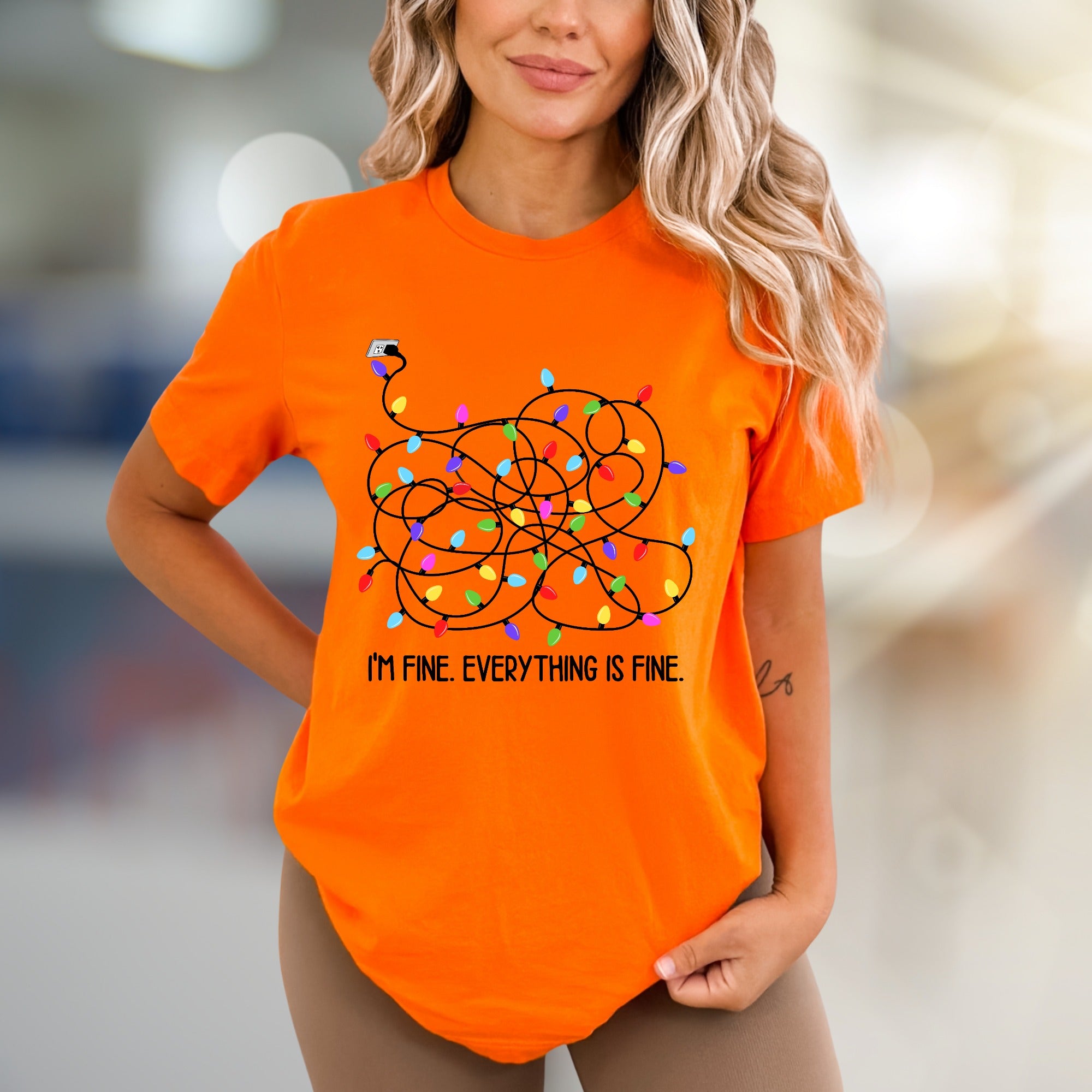 "I'm Fine. Everything Is Fine." Tangled Lights Graphic Tee, a Humorous Holiday Pick for Everyone