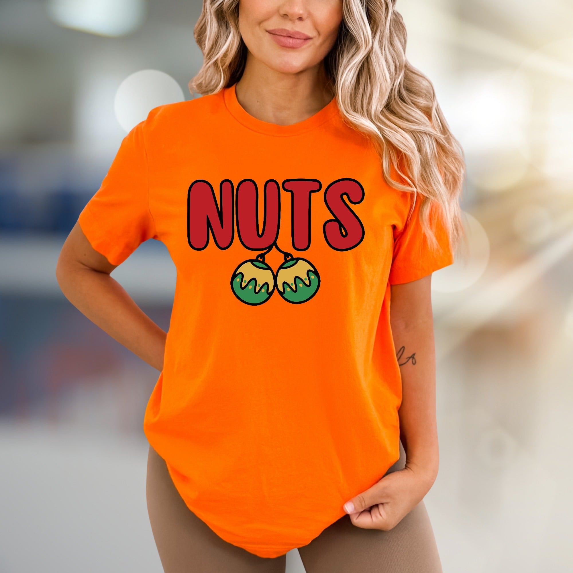 "NUTS" Holiday Balls Graphic Tee, a Festive Pick for Humor Enthusiasts