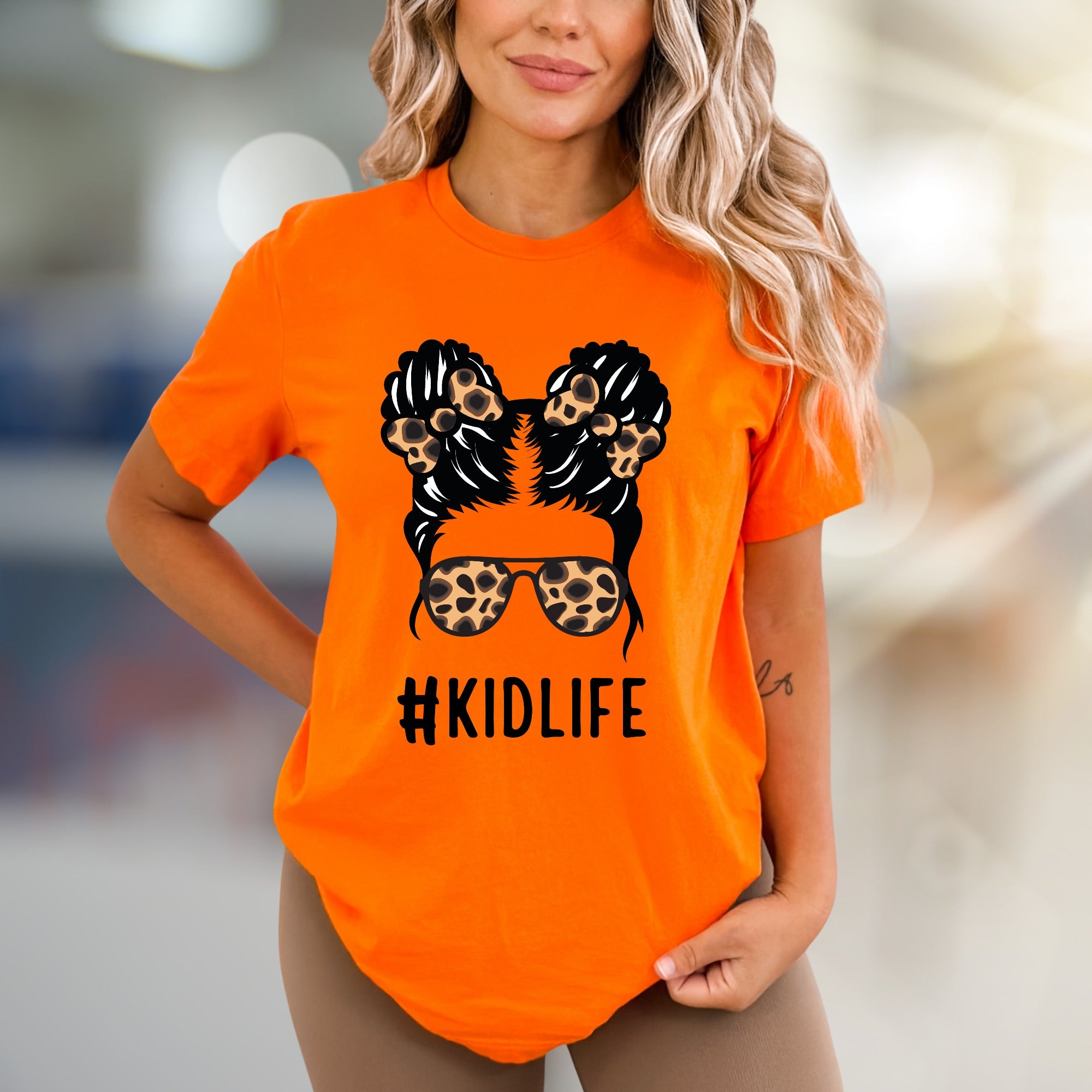 #KIDLIFE Messy Hair Bun Leopard Sunglasses Graphic Tee, a Mom Life Pick for Parents