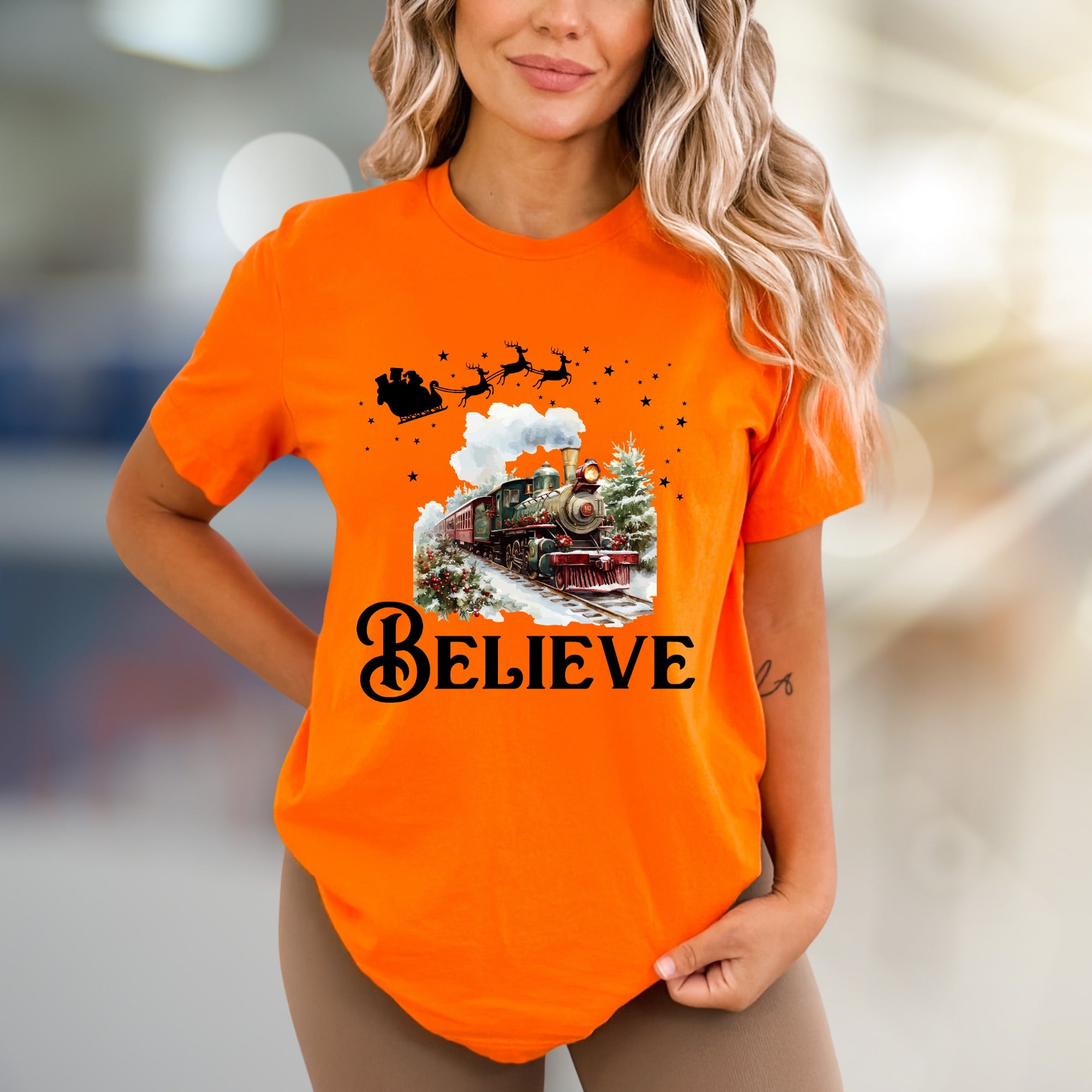 "BELIEVE" Christmas Train Graphic Tee, a Winter Wonderland Pick for Holiday Enthusiasts