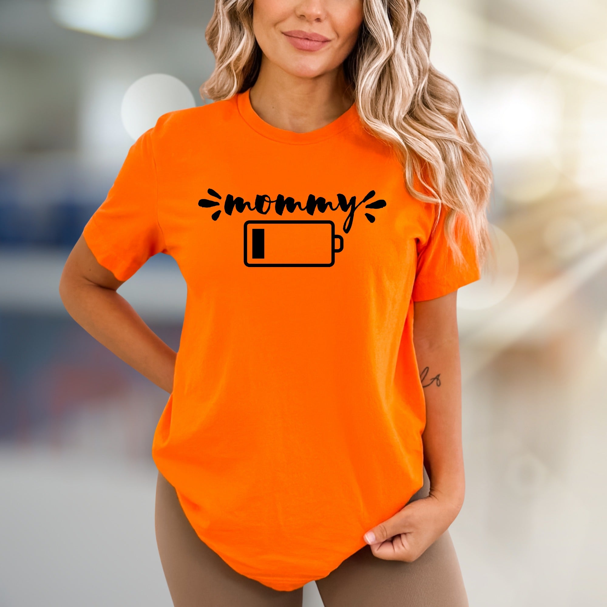 "Mommy Low Battery" Humorous Mom Life Graphic Tee, a Relatable Pick for Tired Parents