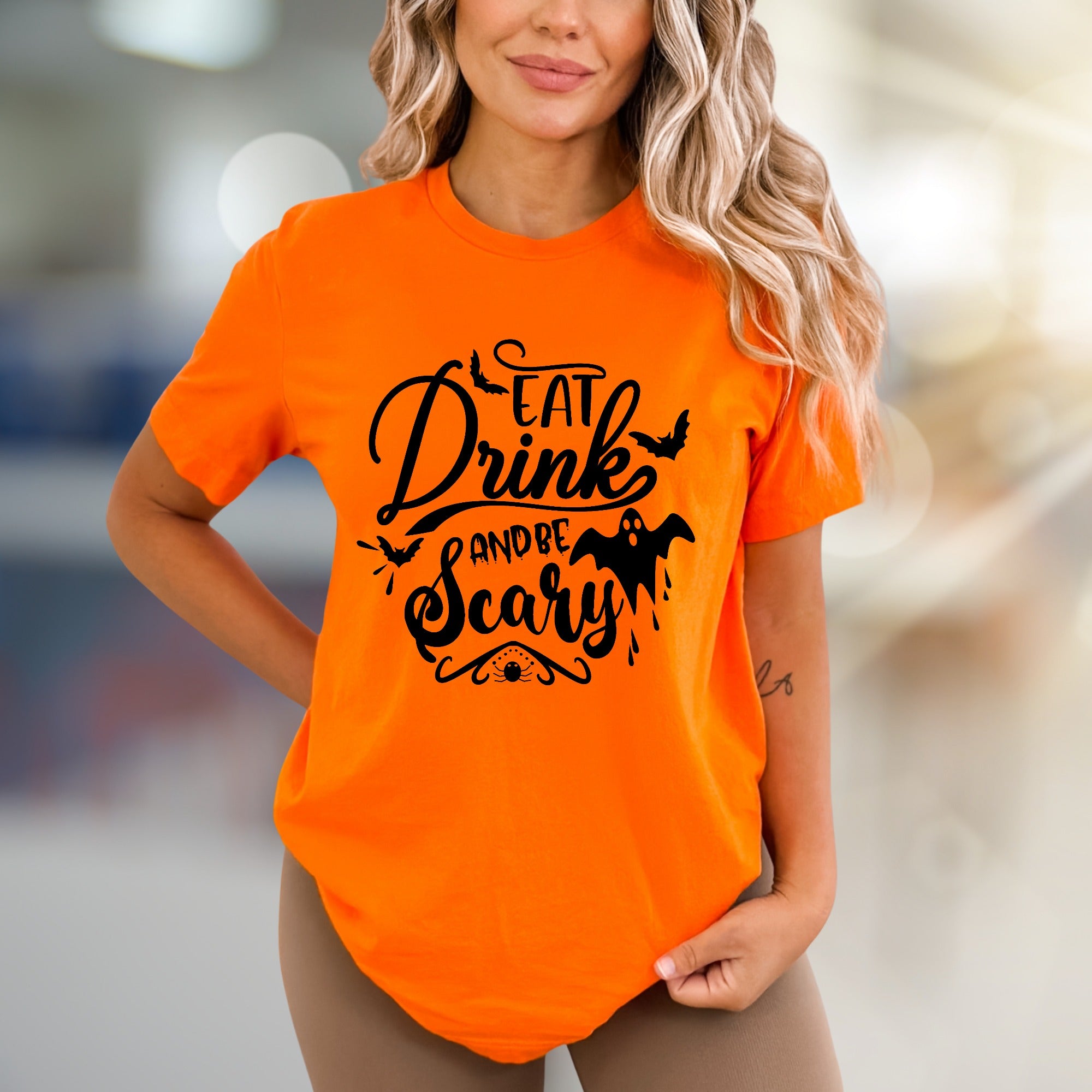 "Eat Drink And Be Scary" Halloween Graphic Tee, a Spooky Chic Pick for Partygoers