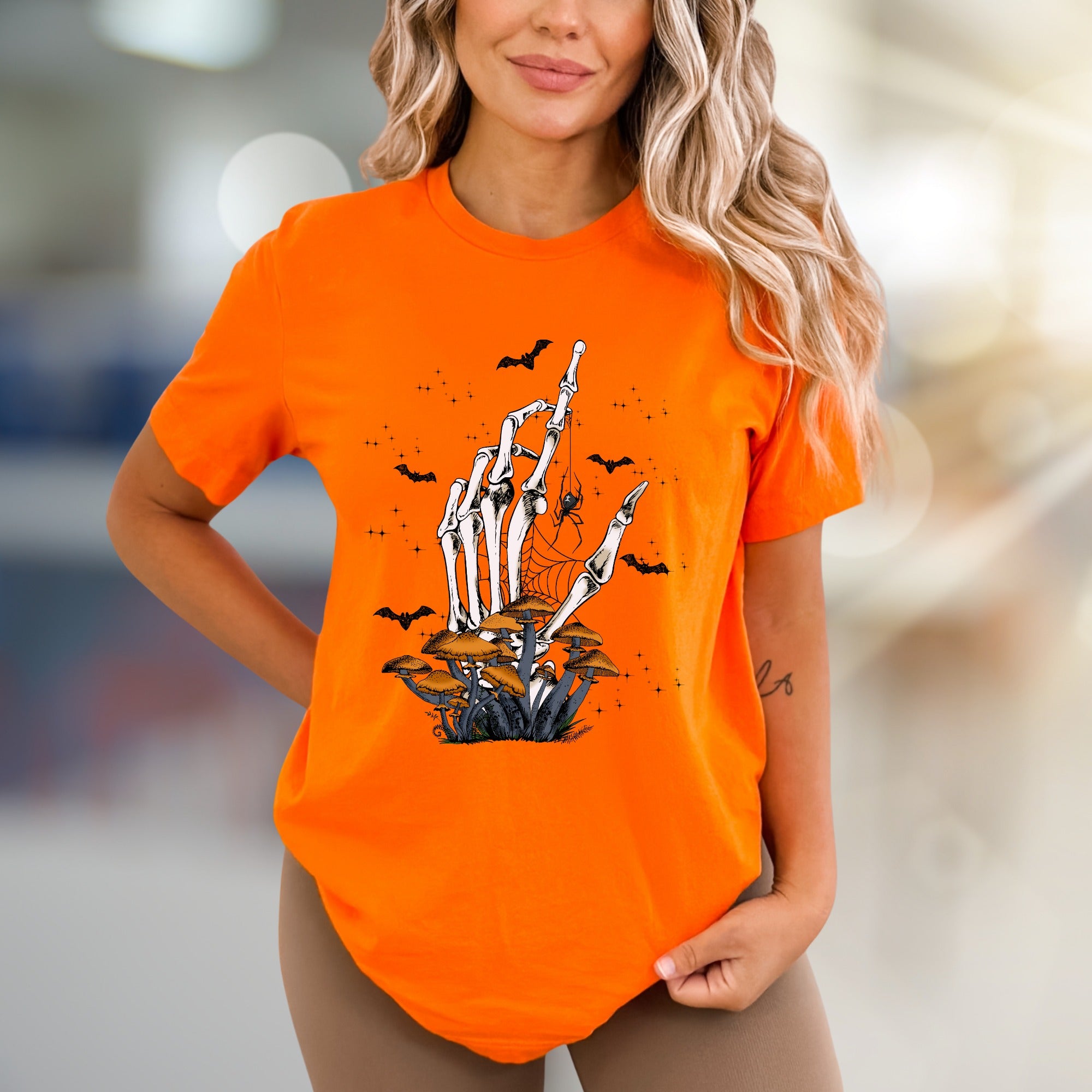 Skeleton Hand Mushroom Graphic Tee, a Spooky-Cute Pick for Halloween Lovers