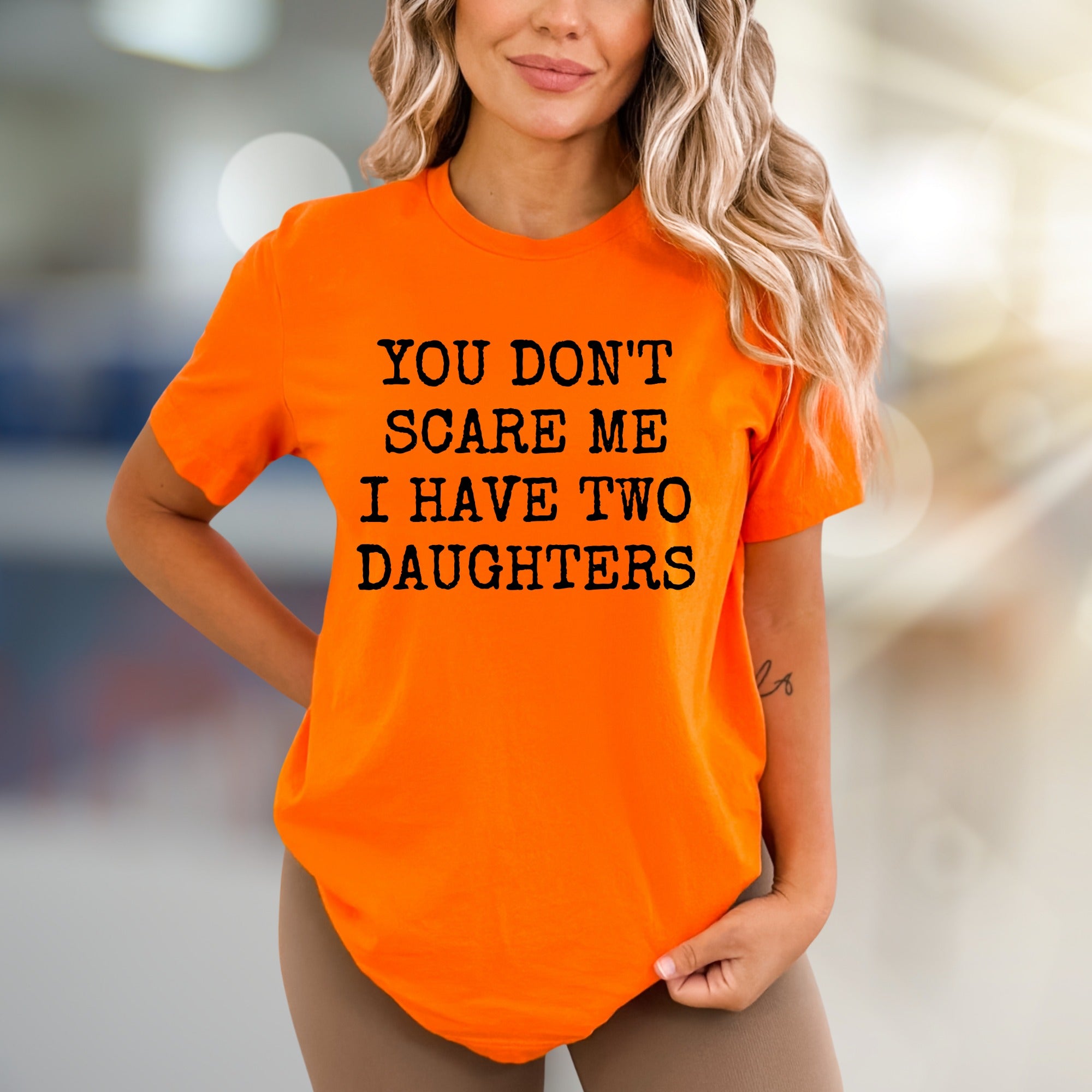 "YOU DON'T SCARE ME I HAVE TWO DAUGHTERS" Funny Parent Graphic Tee, a Bold Statement for Moms & Dads