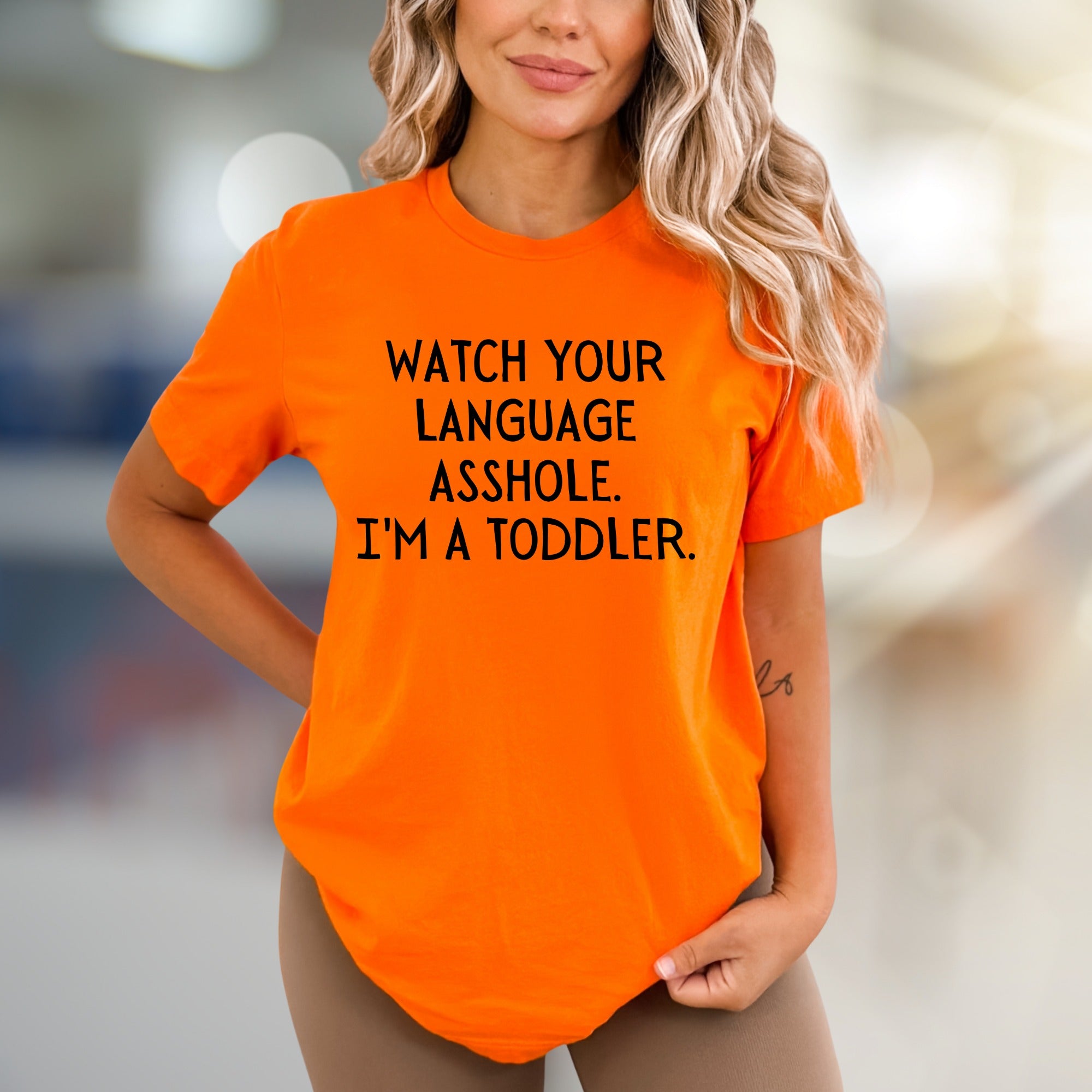 "WATCH YOUR LANGUAGE ASSHOLE. I'M A TODDLER." Humorous Graphic Tee, a Bold Pick for Sarcastic Souls
