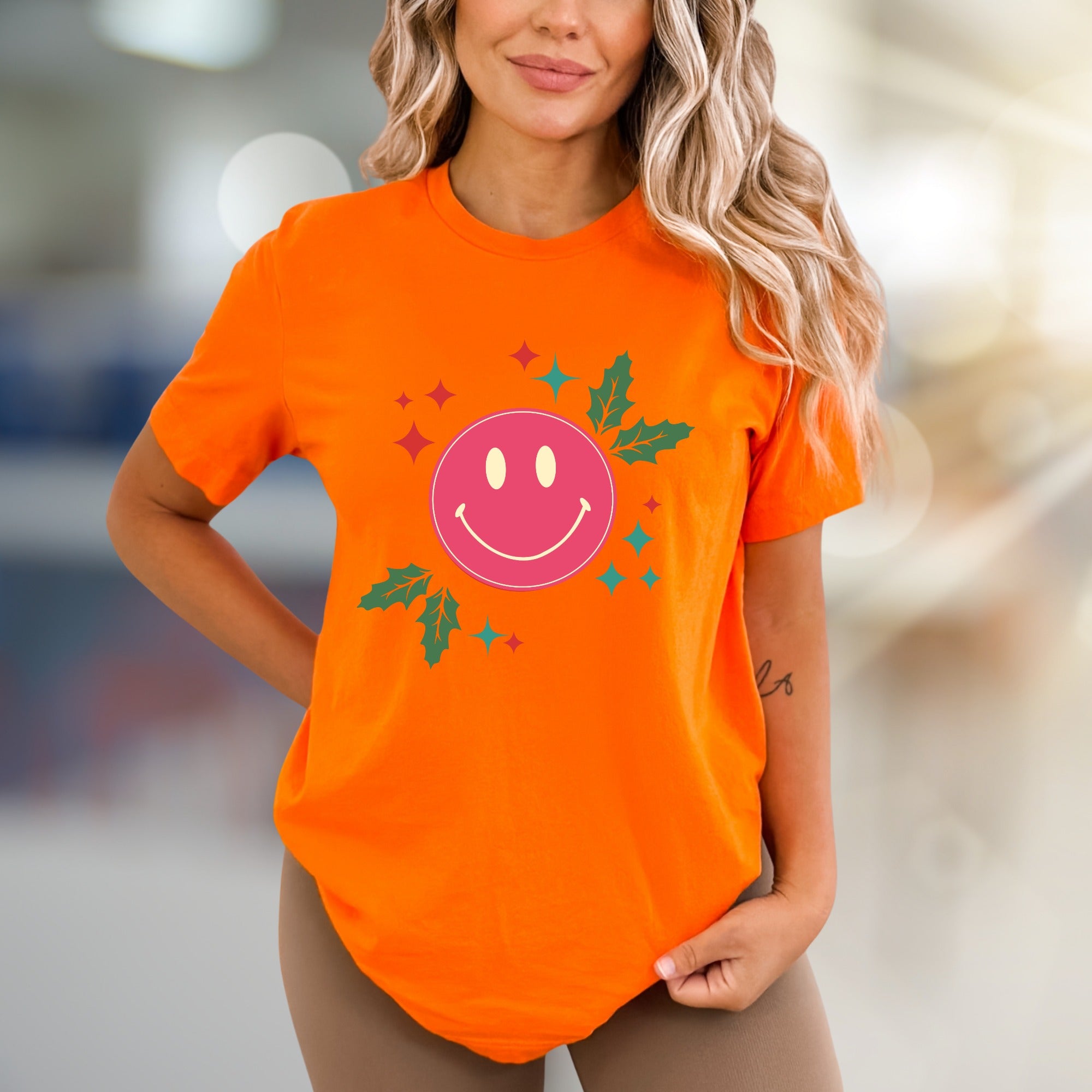 Happy Holly Jolly Smile Face Graphic Tee, a Festive Comfort Pick for Joyful Spirits