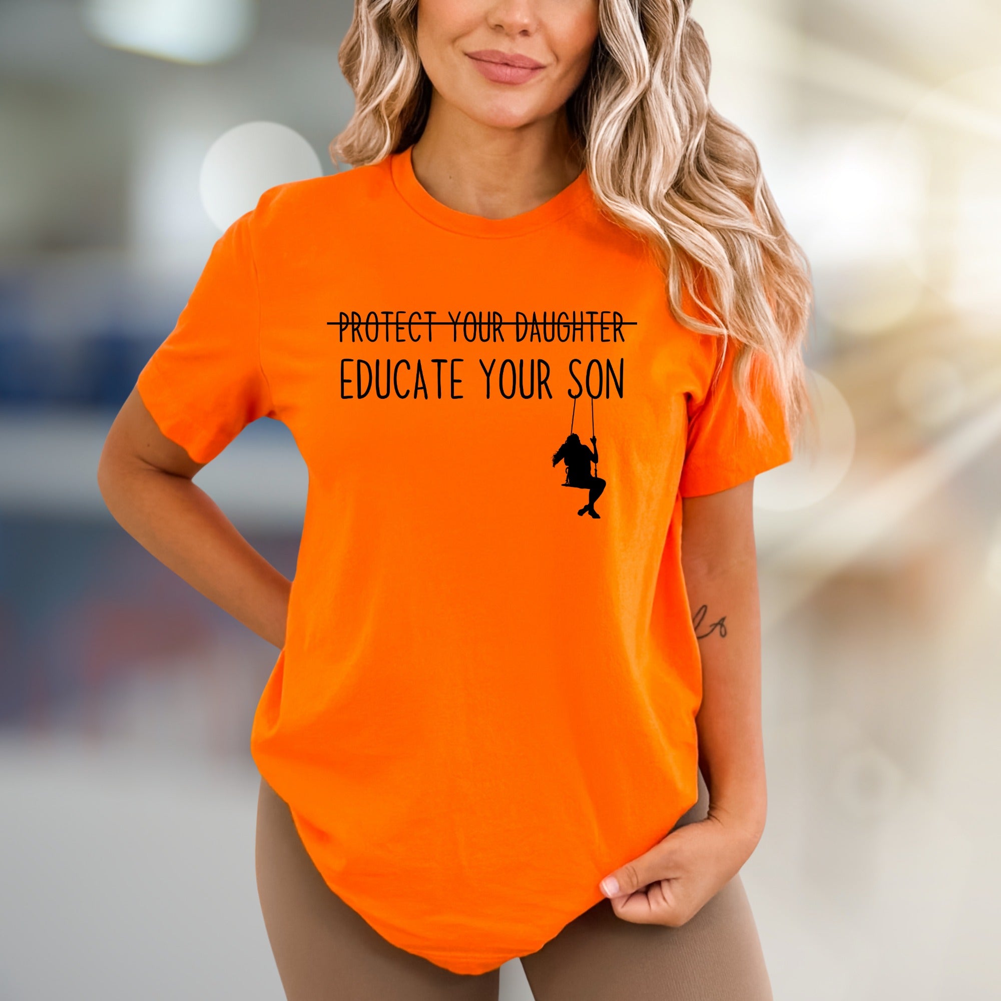 "Protect Your Daughter Educate Your Son" Feminist Graphic Tee, a Statement Pick for Advocates