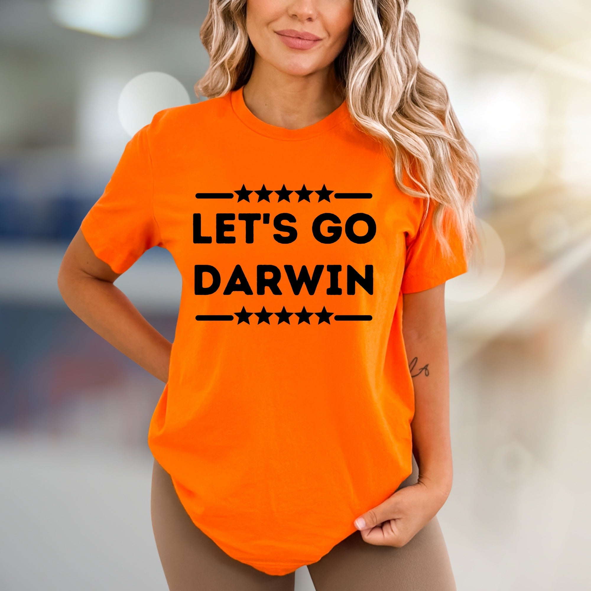 "LET'S GO DARWIN" Stars Graphic Tee, a Bold Statement Unsex Tee for Enthusiasts
