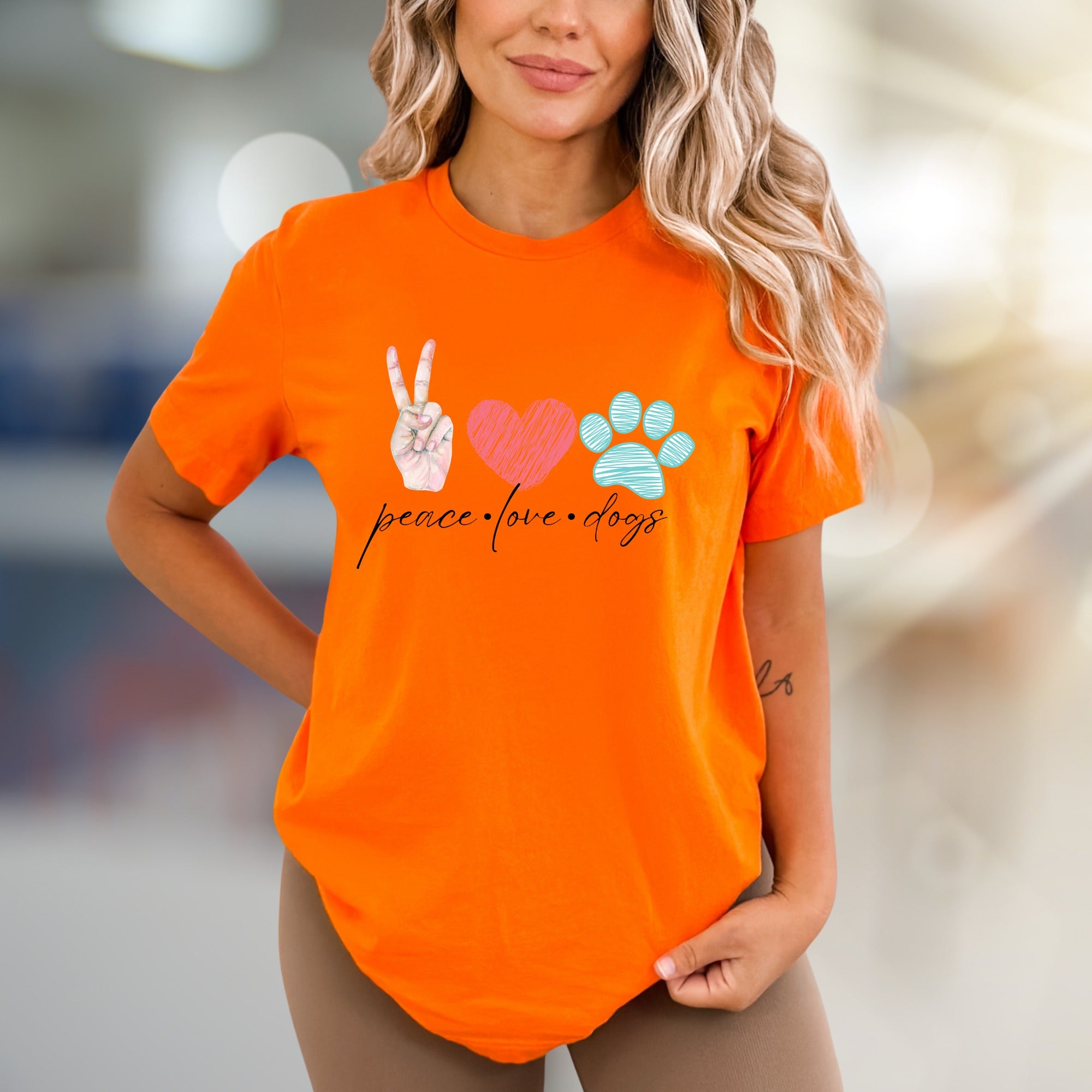 "Peace Love Dogs" Whimsical Pet Lover Graphic Tee, a Heartfelt Pick for Dog Enthusiasts